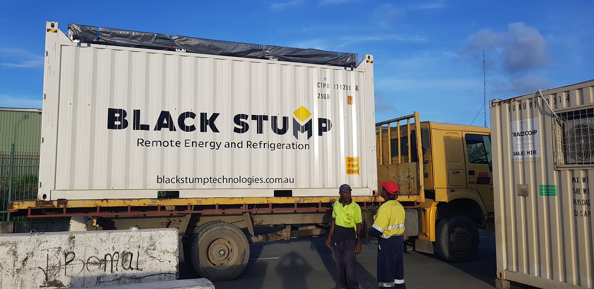 Custom Solarator® mortuary being transported on a flatbed truck