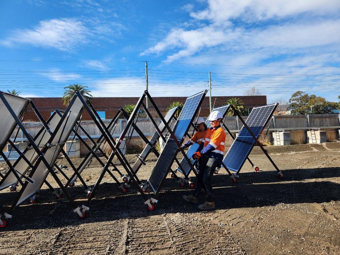 Image of people deploying Solarator Arrays