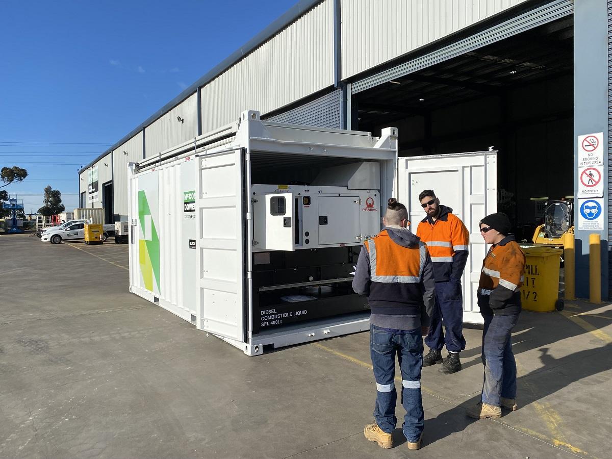 Image of people being trained to operate a Solarator